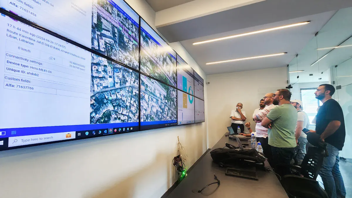 An analytics control room with screens